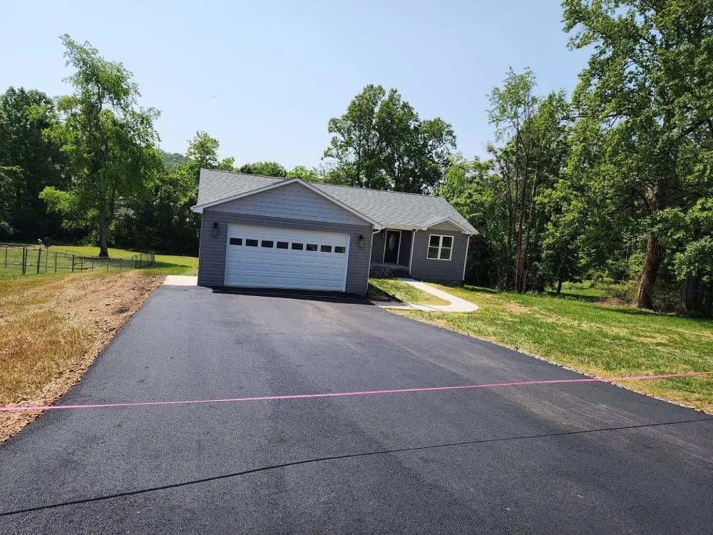 Why Is My Asphalt Driveway Sinking? — E Wells Paving resource