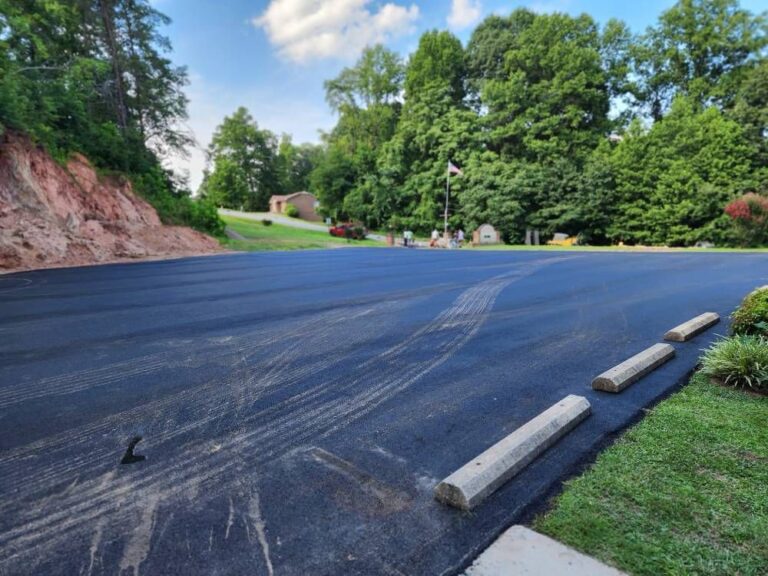 Turn Around Your Summer Blues With Asphalt Sealcoating in South Boston!